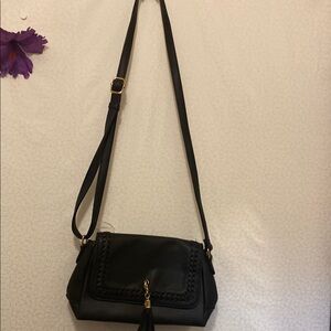 Stylish & Trendy Black Crossbody Bag with Tassel Accent